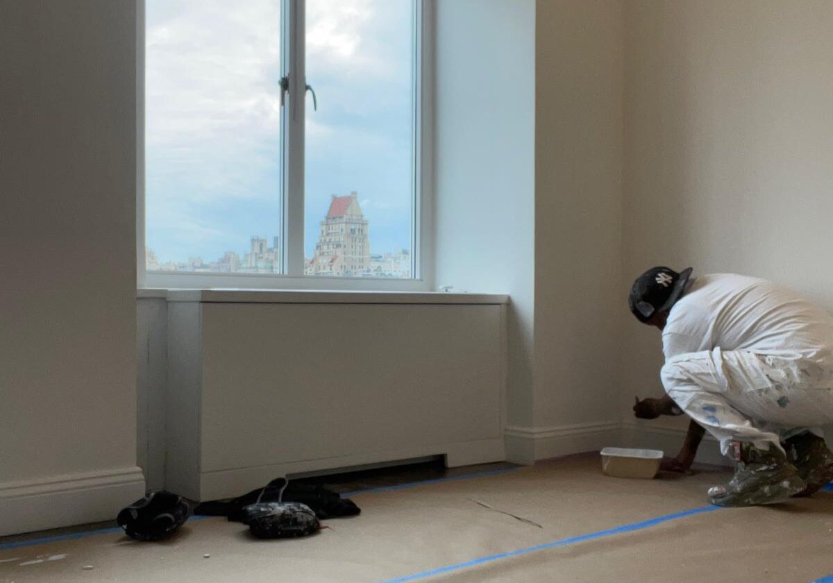Painter working on apartment walls in NYC.
